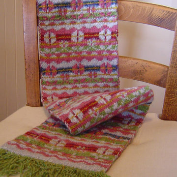 Flowers in winter scarf and hat