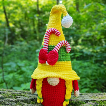 Christmas gnome (girl) with candy canes