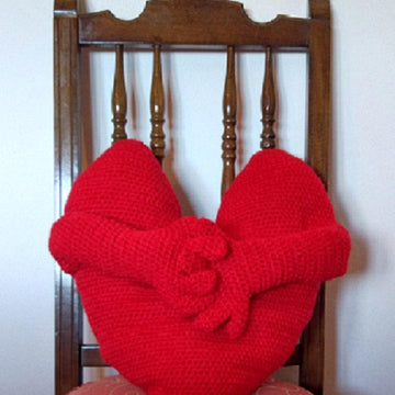 Cojín corazón con brazos