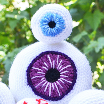 Crochet eyeballs. Creepy eyes. Halloween spooky eyes. Eyeball with blood vessels
