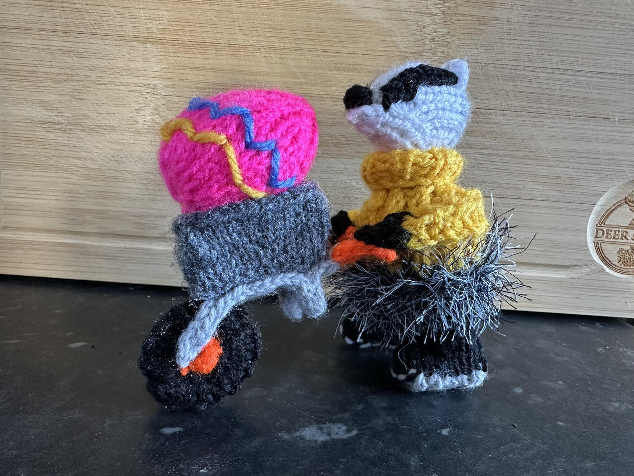 EASTER BADGER PUSHING WHEELBARROW & EGG