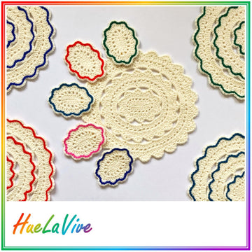 Oval placemat and coaster set by HueLaVive