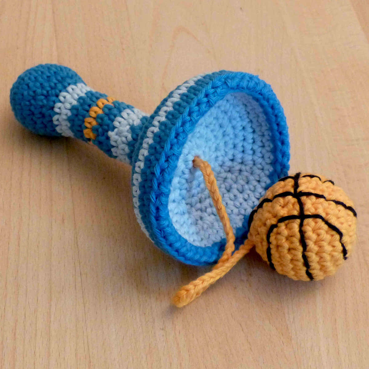 Cup and ball game: basketball