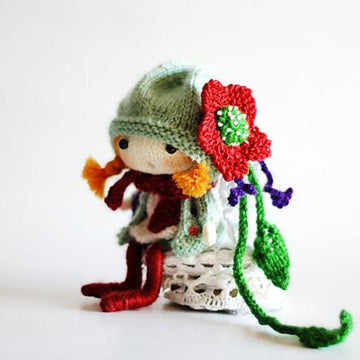 Floret. The Small Doll. She has a mouth with tongue. Wire in the legs