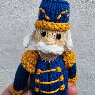 Knitted nutcracker doll