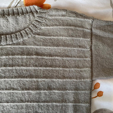 Linear sweater