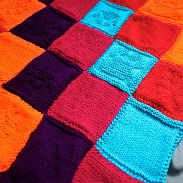 Purly Pawprint Patchwork Blanket