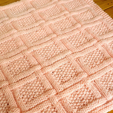Easy woven knit & purl baby blanket