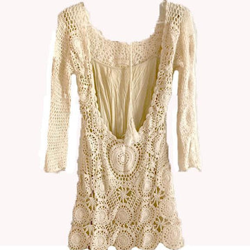 Crochet mini open back dress.