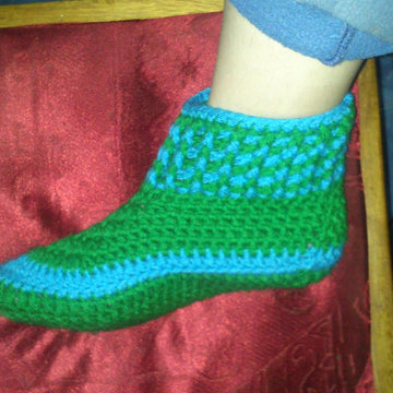 Adult slippers with leather sole