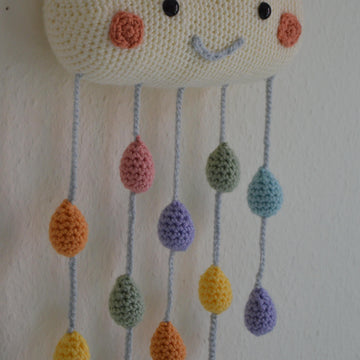 Cloud pillow and mobile with raindrops