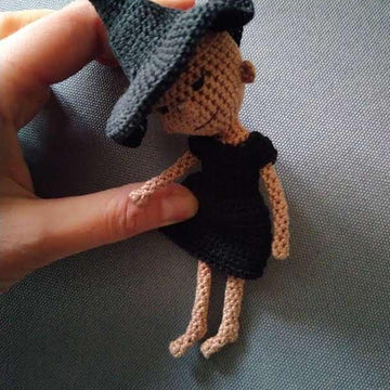 Witch the tiny doll