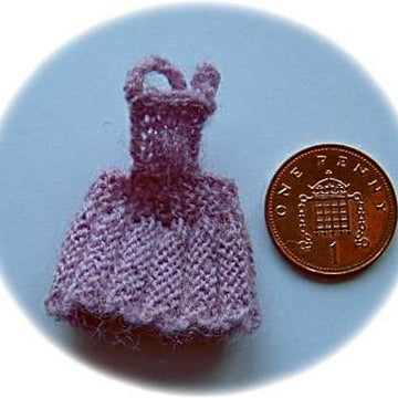 1:12th scale Toddlers dungarees, skirt and jumpers c. 1950s