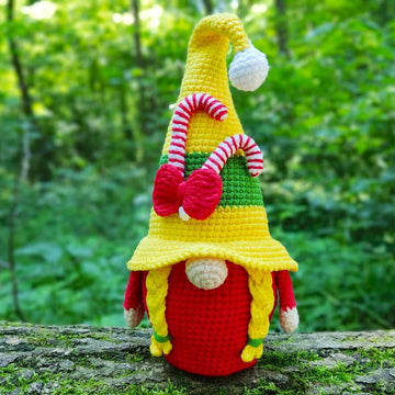 Christmas gnome (girl) with candy canes
