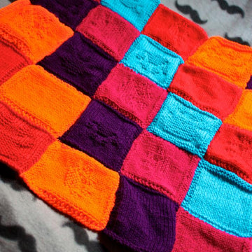 Purly Pawprint Patchwork Blanket