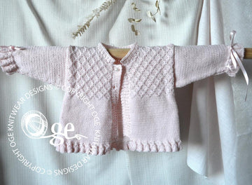 Baby girls sweater with detailed bodice and frilled hemline and cuffs - P025