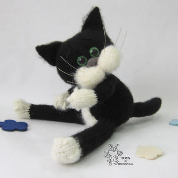A cat is in an overcoat