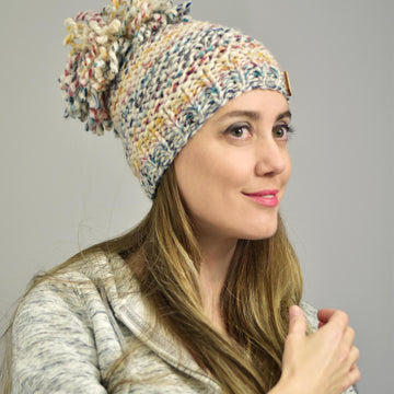 Natashka chunky knit hat with dreadlock pom