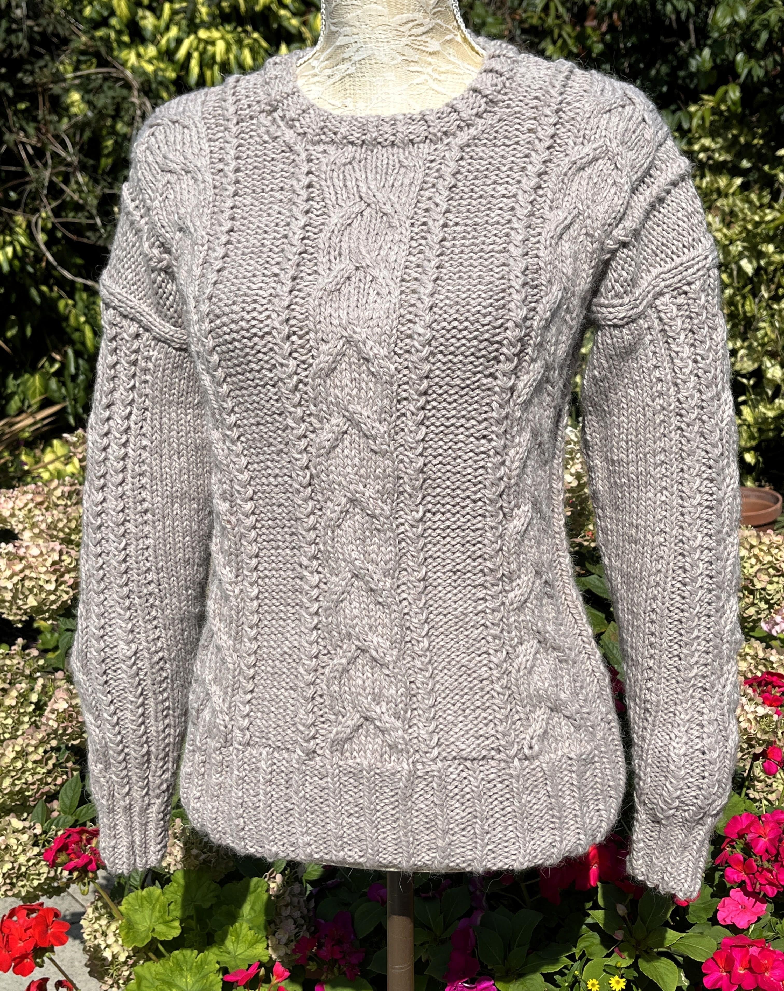 SOFTLY CABLED NEAT FITTING SWEATER