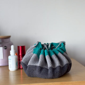 'Flat out' make-up bag