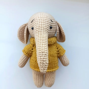 Elephant in a sweater plush toy