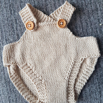 Knitted dolls romper