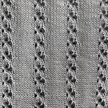 Eyelet Sweater with Floaty Peplum