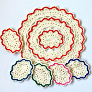 Oval placemat and coaster set by HueLaVive