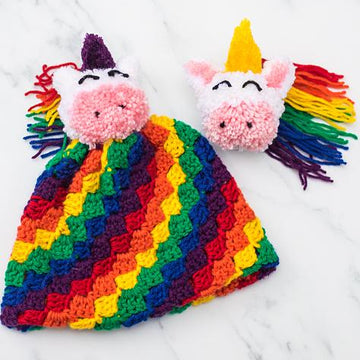 C2C Rainbow Hat with Unicorn Pom Pom