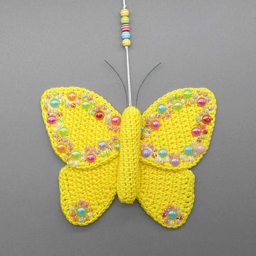 Butterfly hanging decoration - simple made from scraps of yarn