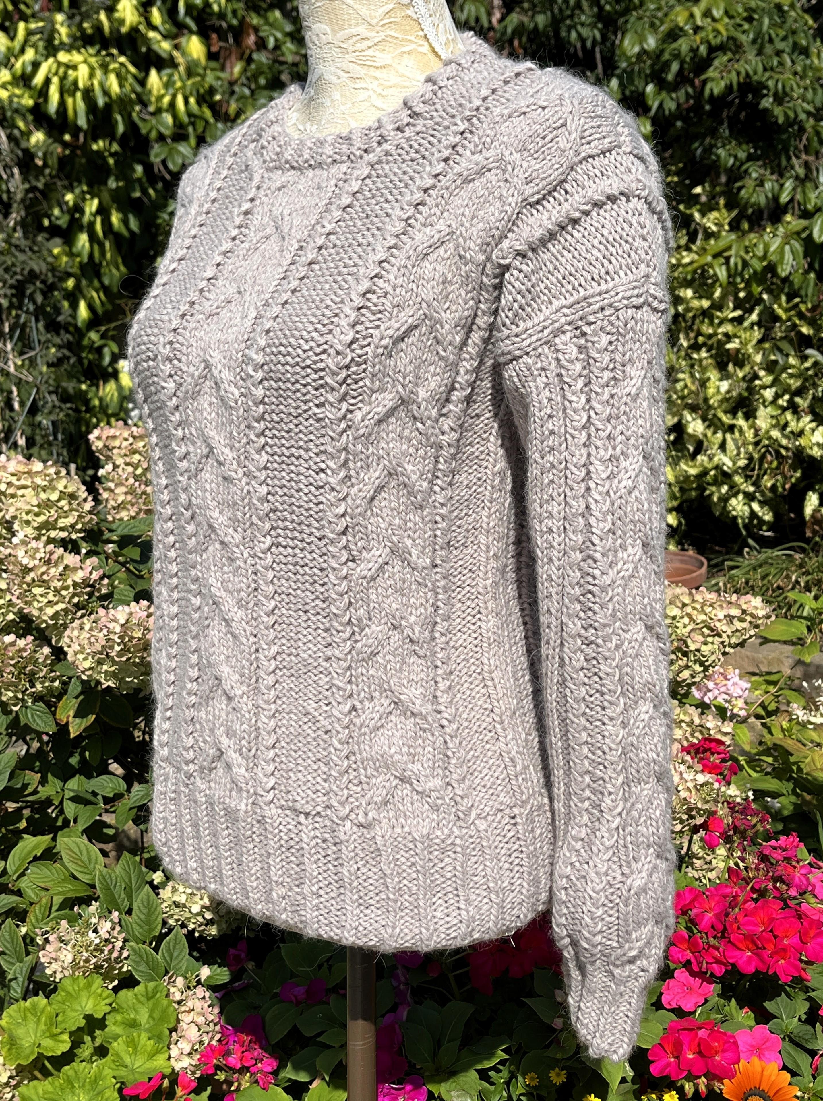 SOFTLY CABLED NEAT FITTING SWEATER