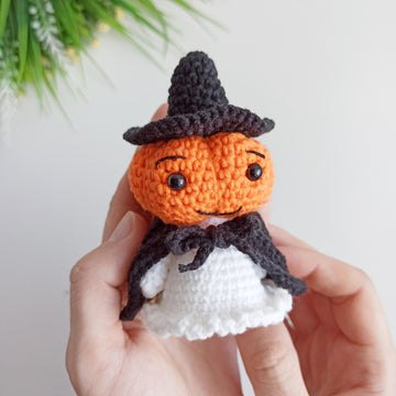 Halloween ghost with a pumpkin head
