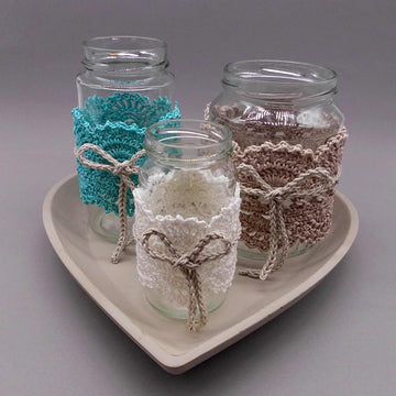 Crochet shabby style decoration from scraps of yarn for used glasses