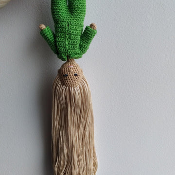 Tiny pose-able doll