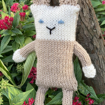 The rabbit knitted soft toy