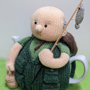 Monty goes fishing tea cosy