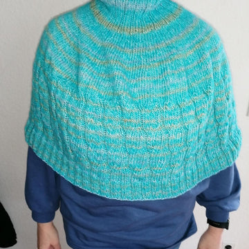 El8ngated poncho