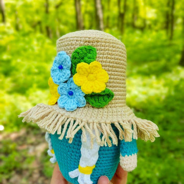 Gnome (girl) in a straw hat