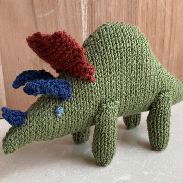 Stegosaurus and Triceratops knitted soft toys