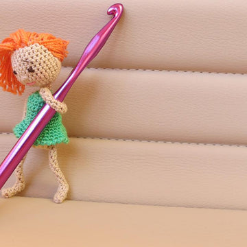 Tiny amigurumi doll