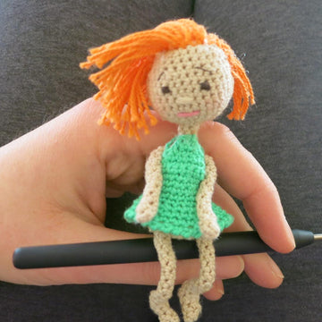 Tiny amigurumi doll
