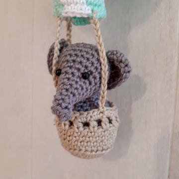 Elephant in a hot air balloon