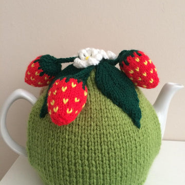 Nature tea cosy. Animal tea cosy .Pesky mouse in the strawberry patch