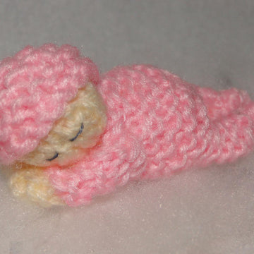 Lovely sleeping baby knitting pattern