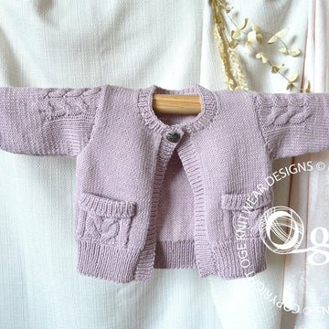 Child’s Cardigan with cable detail on sleeves and pockets - P065