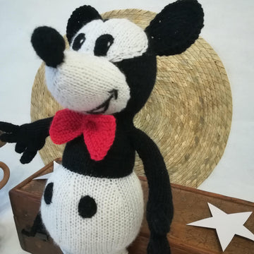 Knitting patterns for Mickey Mouse and Minnie Mouse toys based on Steamboat Willi