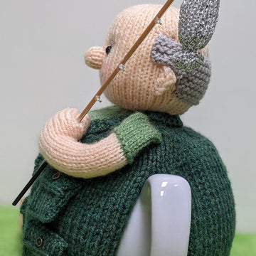 Monty goes fishing tea cosy