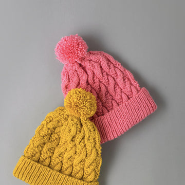 Modern Cable Hat - Free Knitting Pattern for Women in Paintbox Yarns Simply Aran by Paintbox Yarns