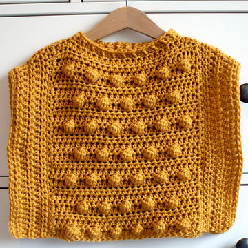 Modern Bobble Poncho (Child Size) US Terminology by Melu Crochet
