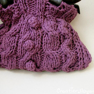 Cables and bobbles handbag
